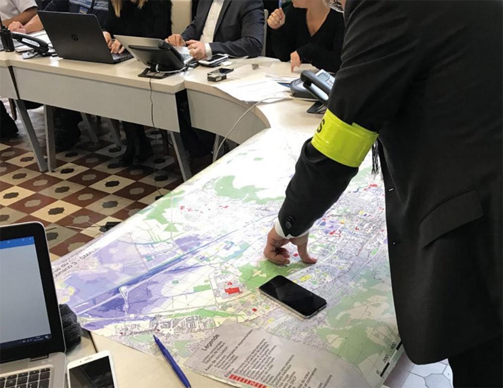 Strategy team in a meeting room reviewing territorial decisions